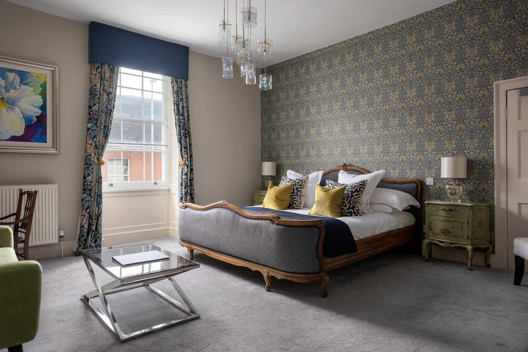 An ornate, large hotel room
