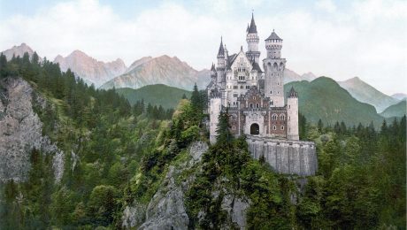 A fairytale castle on a mountainous hill.