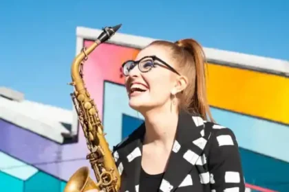 Jess Gillam with saxophone.