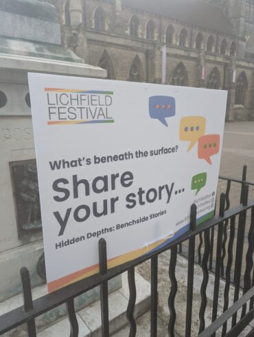 A sign saying 'share your story - benchside stories'