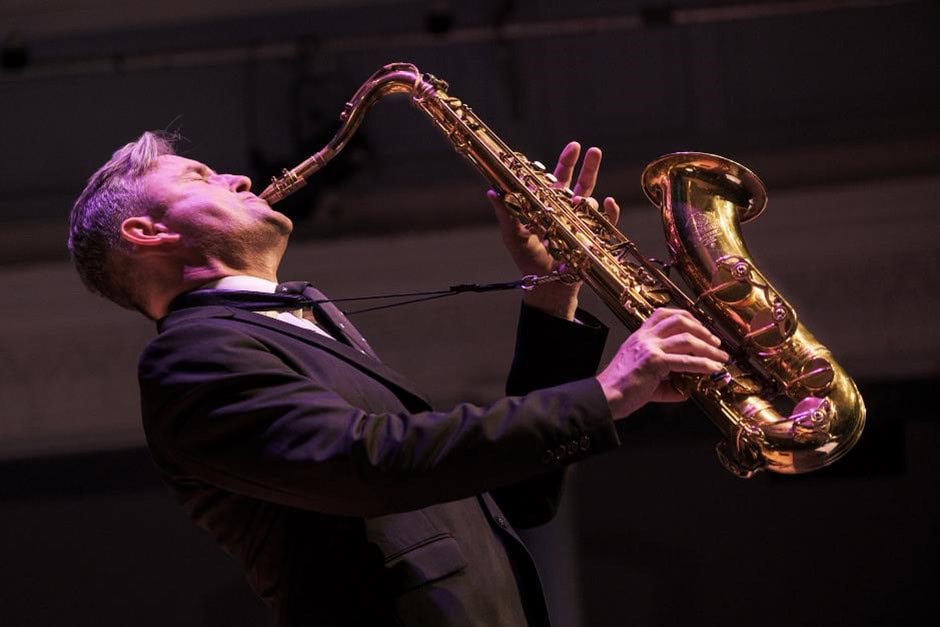 Tommy Smith plays Saxophone on stage