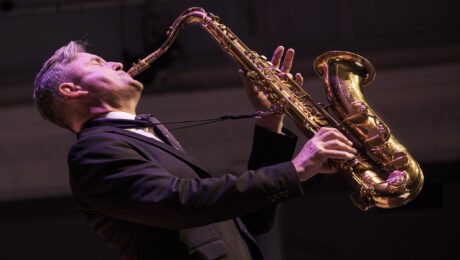 Tommy Smith plays Saxophone on stage