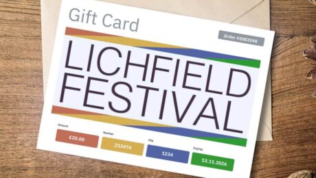 A Lichfield Festival gift card on top of an envelope